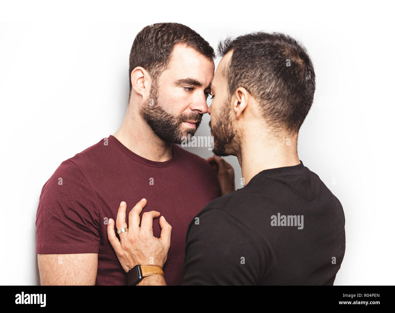 young-homosexuals-gay-couple-love-each-other-on-a-white-background-R04PEN.jpg