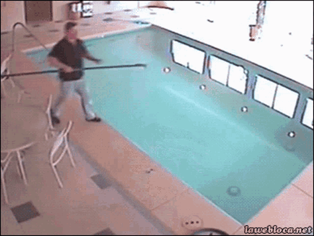 the-big-fail-by-falling-into-the-pool-trying-to-clean-it.gif